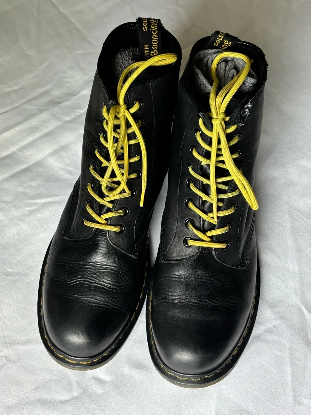 Dr. Martens Black Leather Boots with Yellow Laces